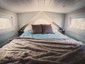 Фото спальни домика на колесах Little Bitty Tiny House