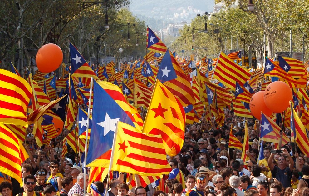 Marchers demonstrate during Catalan National Day in Barcelona