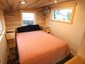 Фото интерьера спальни дома на колесах Mitchcraft Gooseneck