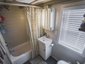 Фото ванной домика на колесах Little Bitty Tiny House